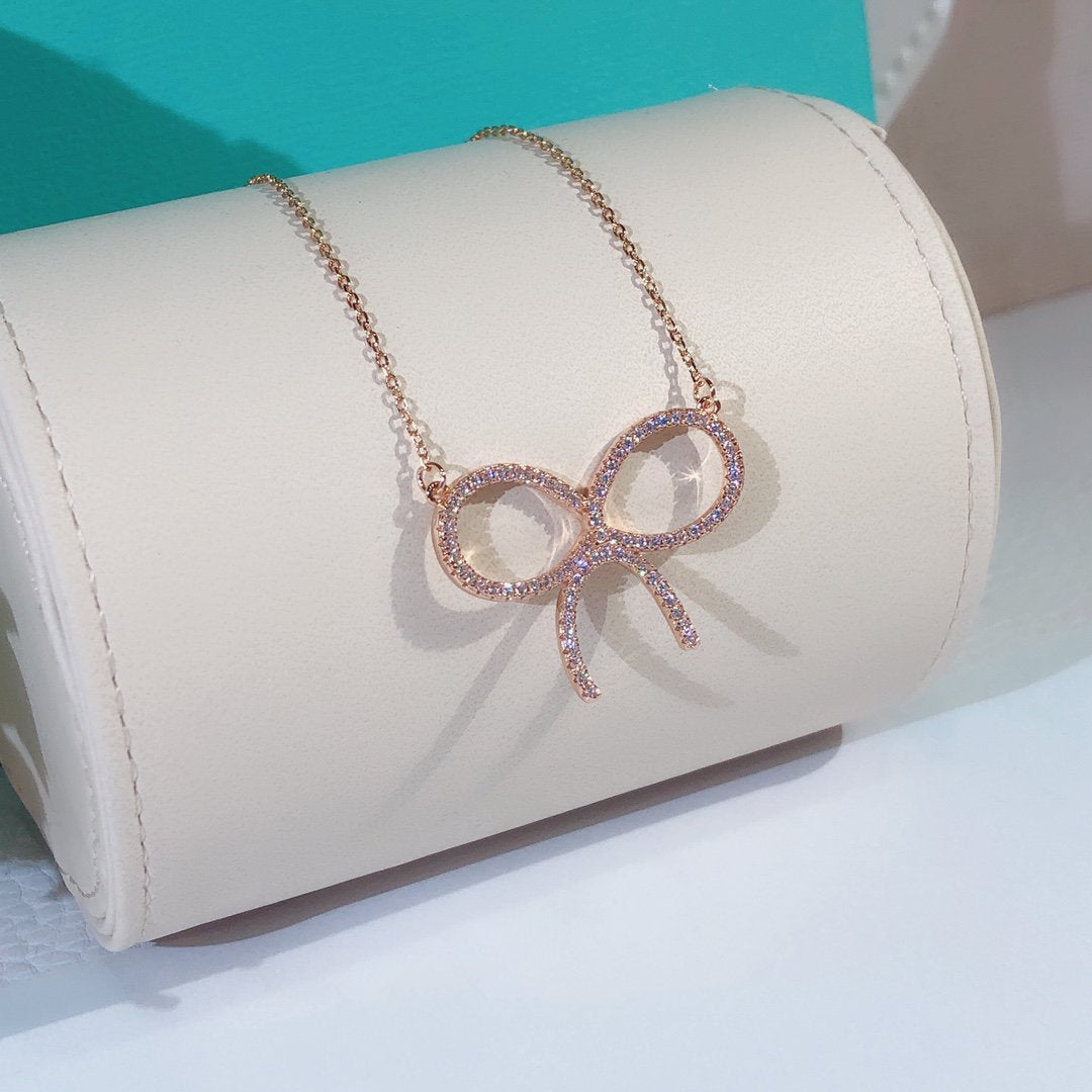 [⭐JeweliWhal]CLAW SET RHODIUM PLATED BOW NECKLACE