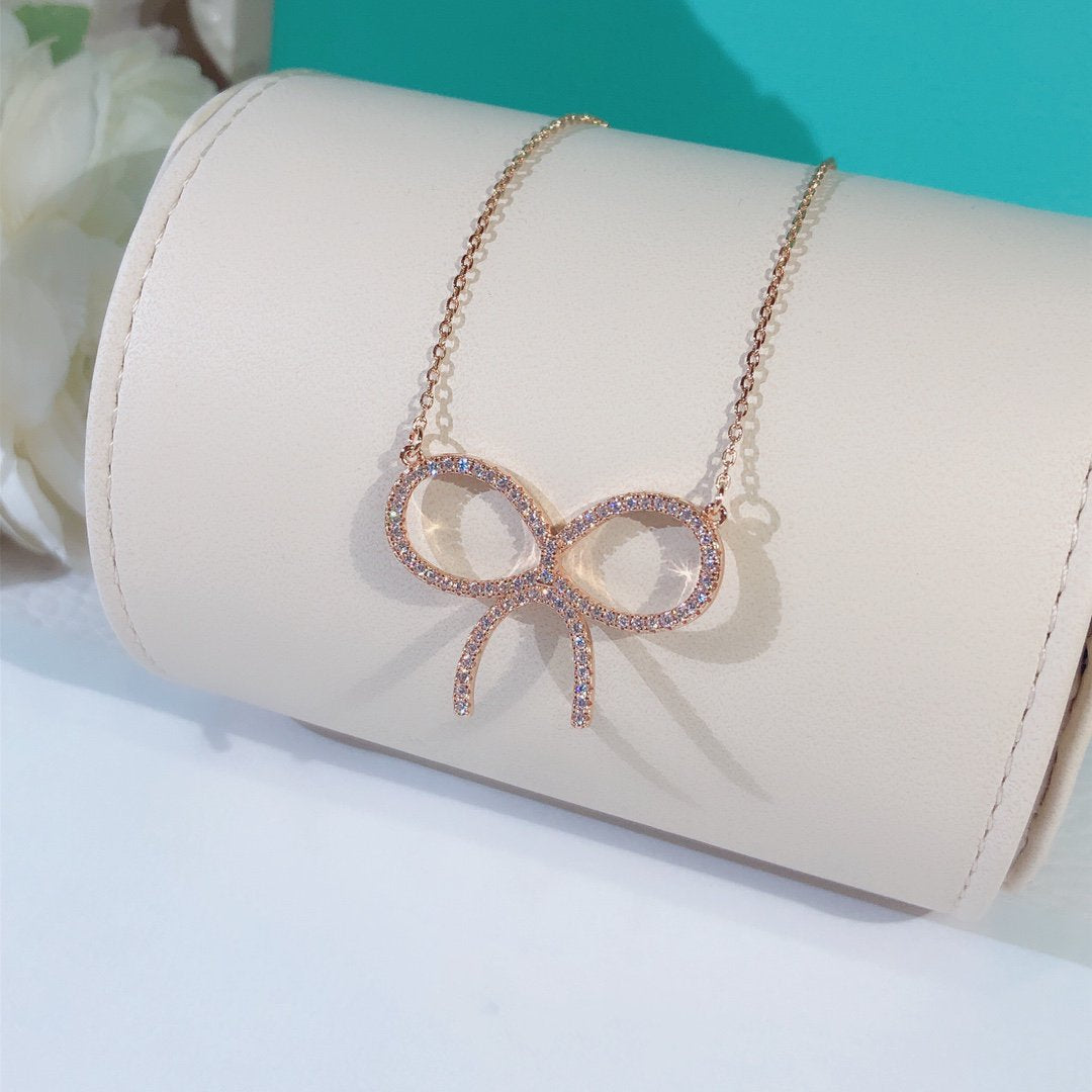 [⭐JeweliWhal]CLAW SET RHODIUM PLATED BOW NECKLACE