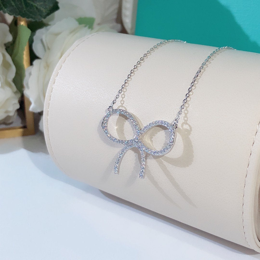 [⭐JeweliWhal]CLAW SET RHODIUM PLATED BOW NECKLACE