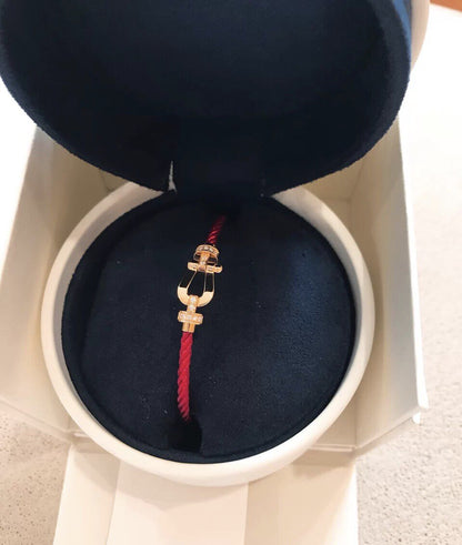 {
  "⭐⭐JeweliWhal": "フォース10 ハーフダイヤモンド ピンクゴールド レッドコード ラージ＆ミディアムモデル"
}