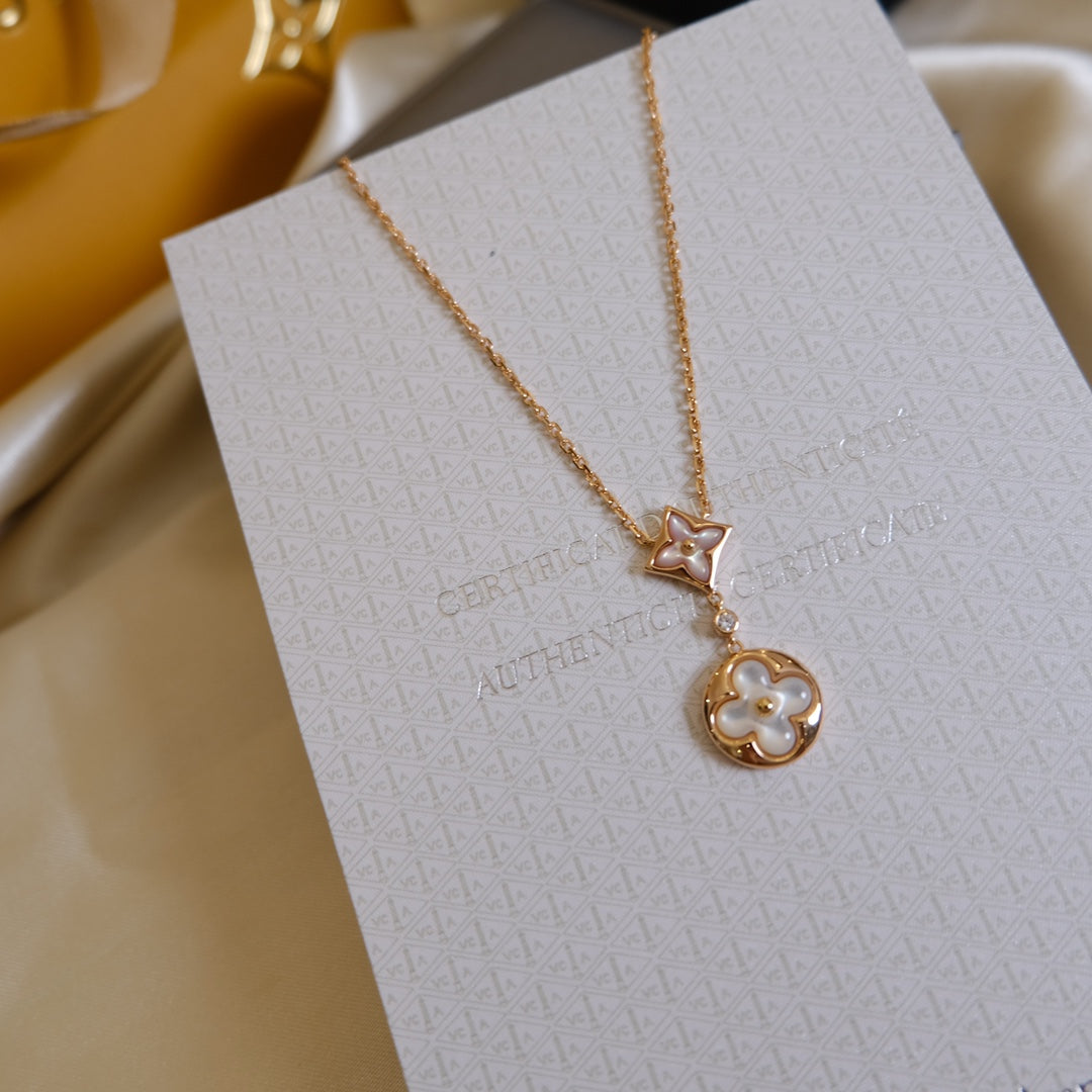 {"[⭐⭐JeweliWhal]STAR AND SUN WHITE MOP 2 MOTIF PINK GOLD NECKLACE"}