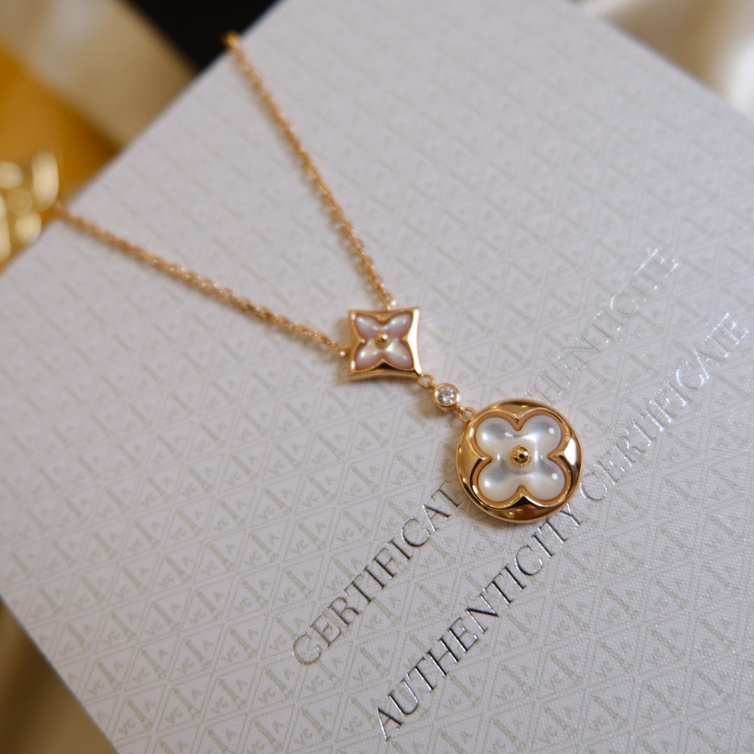 {"[⭐⭐JeweliWhal]STAR AND SUN WHITE MOP 2 MOTIF PINK GOLD NECKLACE"}