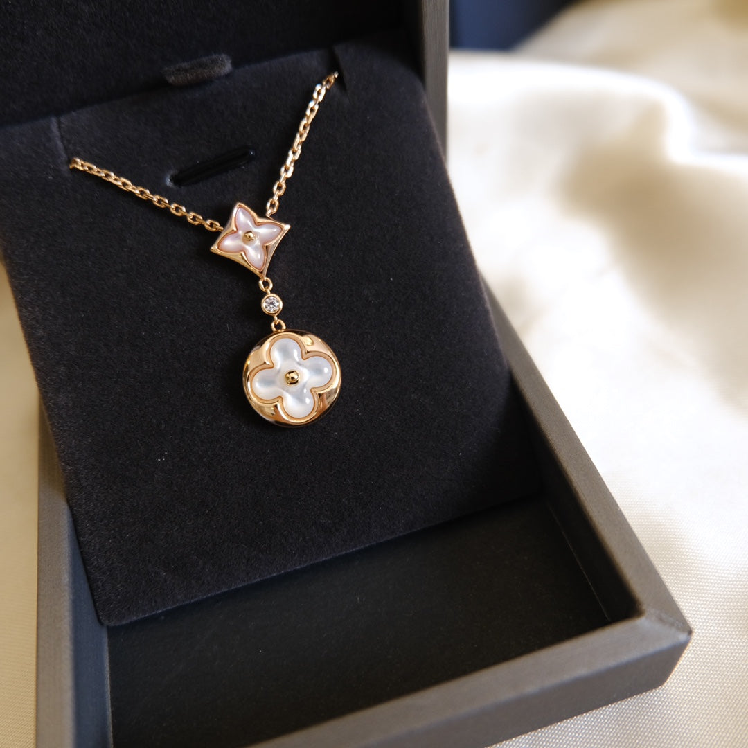 {"[⭐⭐JeweliWhal]STAR AND SUN WHITE MOP 2 MOTIF PINK GOLD NECKLACE"}