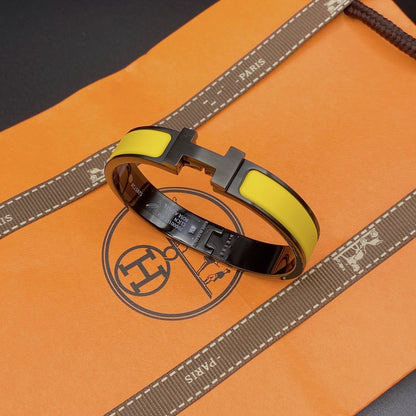 [⭐⭐JeweliWhal]CLIC HM SO BLACK YELLOW BRACELET